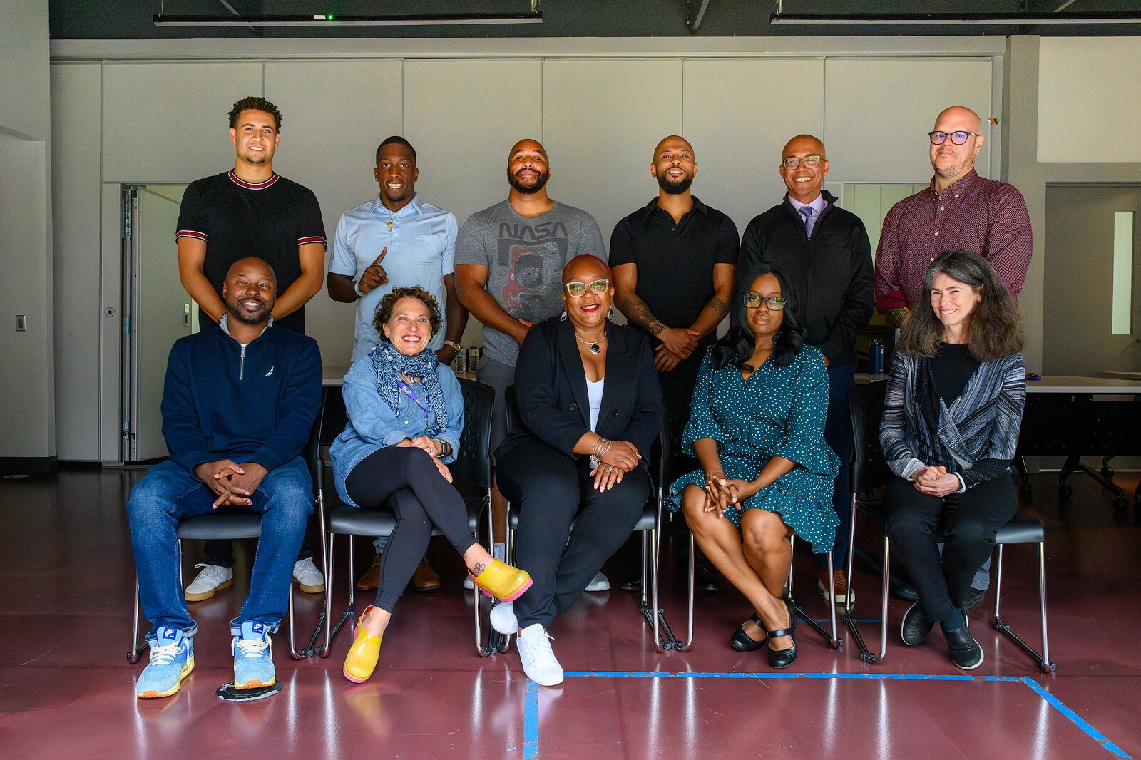 Coaltion members (back row) Jackson Greenstone, Deshawn Leeth, Justin Harper, Kiyoshi Shelton, Derrick Jackson, and Corey Telin; (front row) Jamall Bufford, Lori Bennett, Cherisa Allen, Pamela Tooson, and Jamie Abelson meet at Ozone House.
