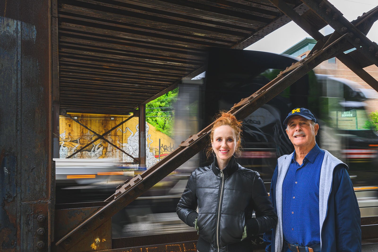 Laura Russello and Larry Nisson at the Huron Street bridge near North First Street.