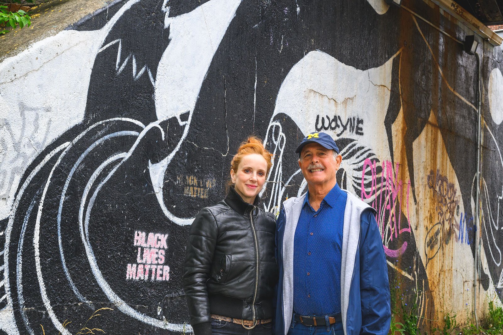 Laura Russello and Larry Nisson at the Huron Street bridge near North First Street.