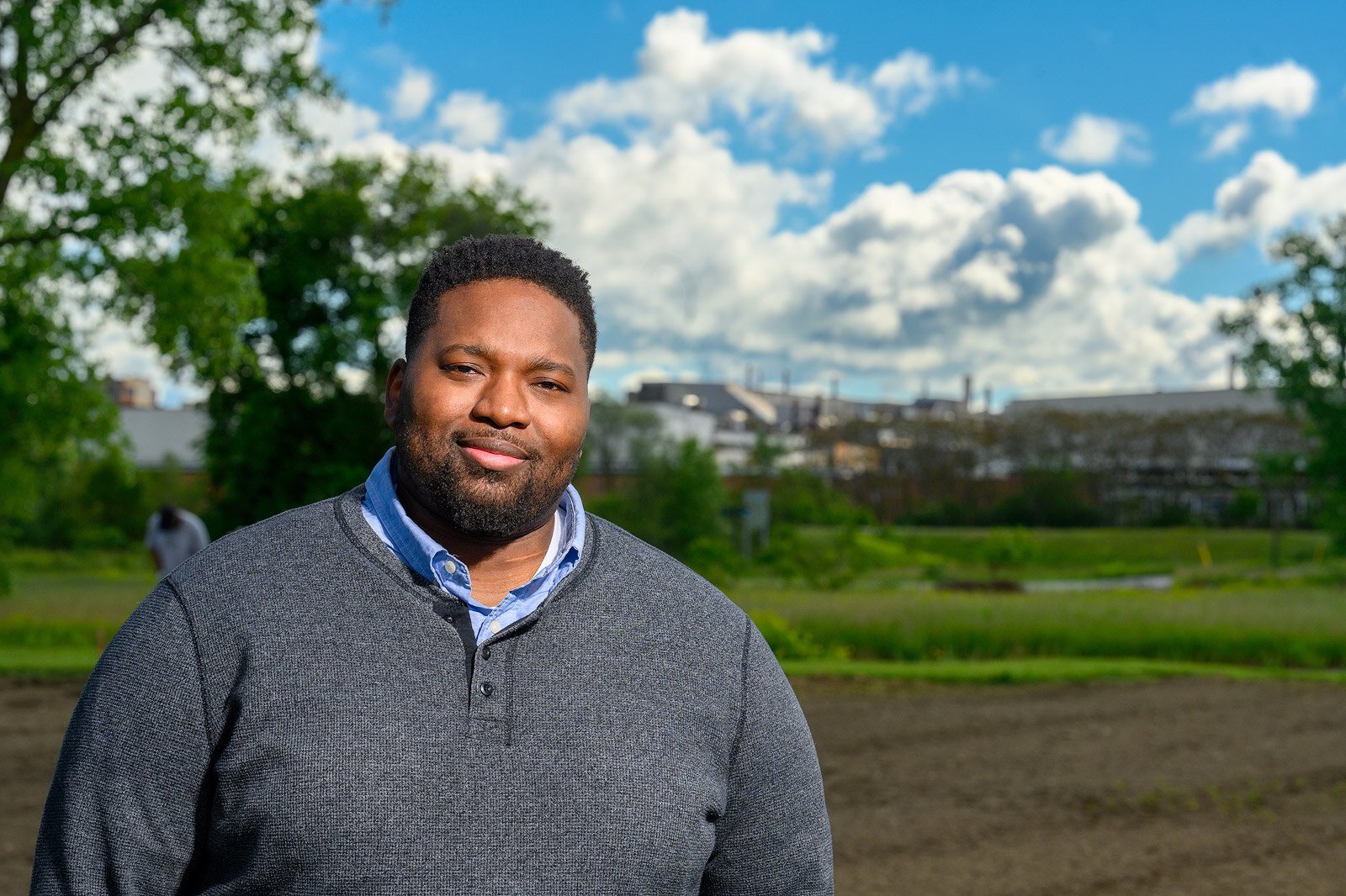 Pastor David Crout of New Covenant Missionary Baptist Church by the church's gardens.