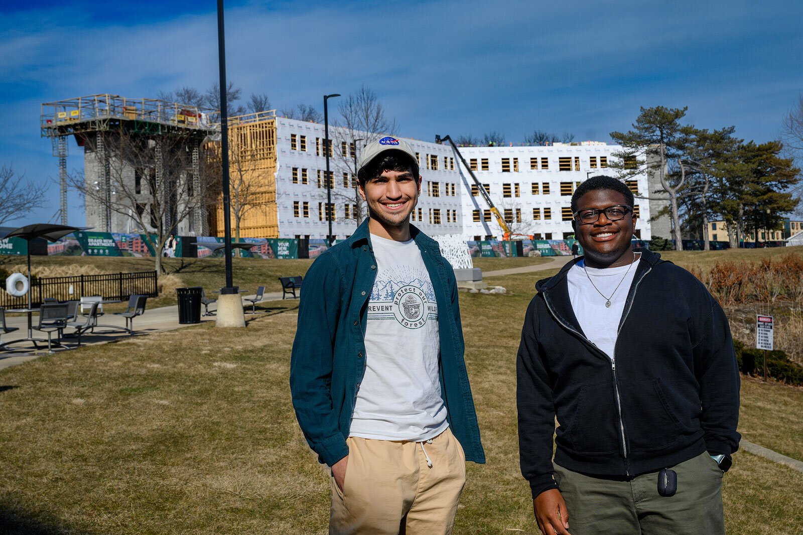 Auryon Azar and Cedrick Charles in front of the future New Lakeview Apartments at EMU.