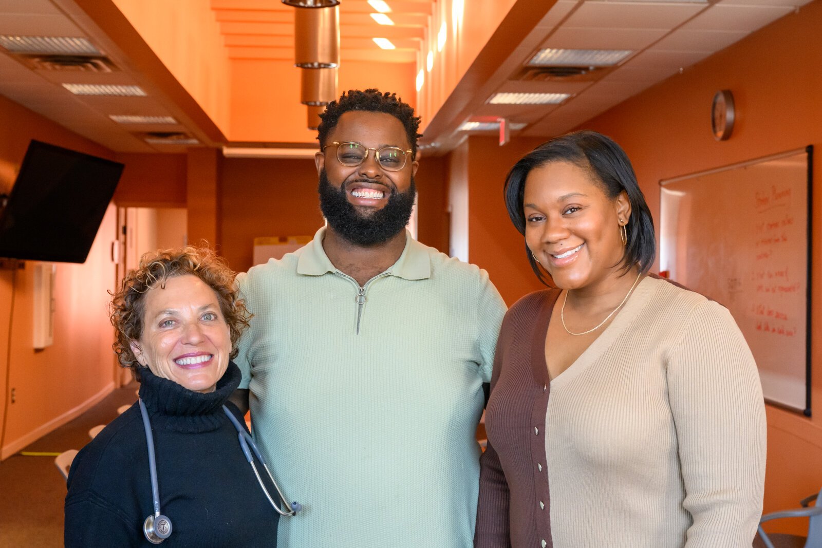 Clinic Director Lori Bennett, Behavioral Health Therapist Aaron Neal, and Outreach & Education Manager Ashely Anderson at Corner Health Center.