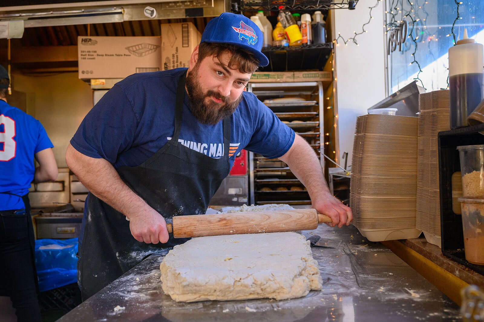 Side Biscuit owner Jordan Balduf getting ready for Super Bowl Sunday.