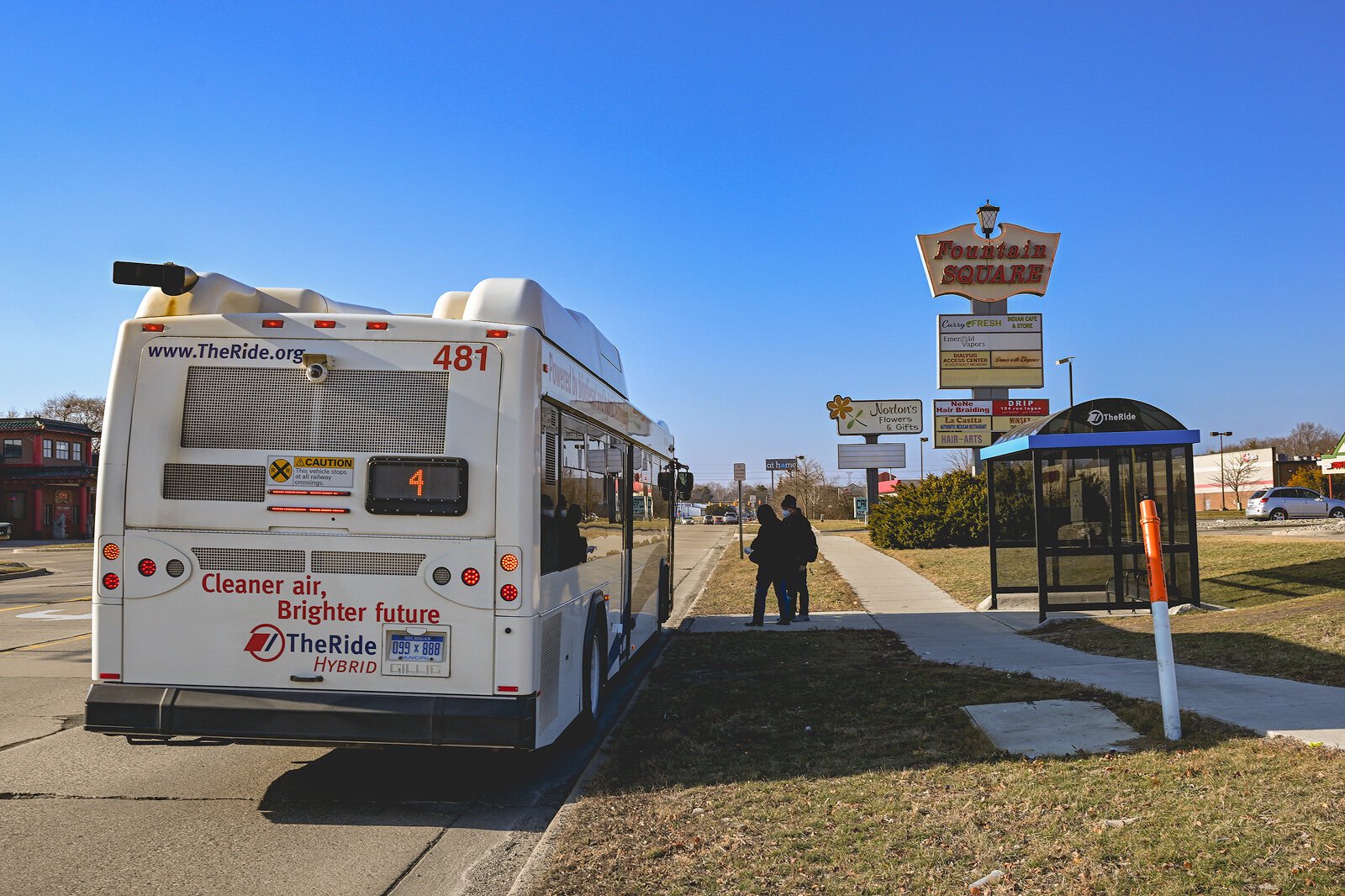 A new sidewalk and bus stop on Washtenaw Avenue.