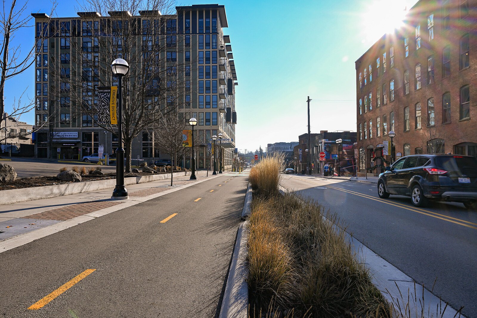 A protected bike lane on First Street in Ann Arbor.