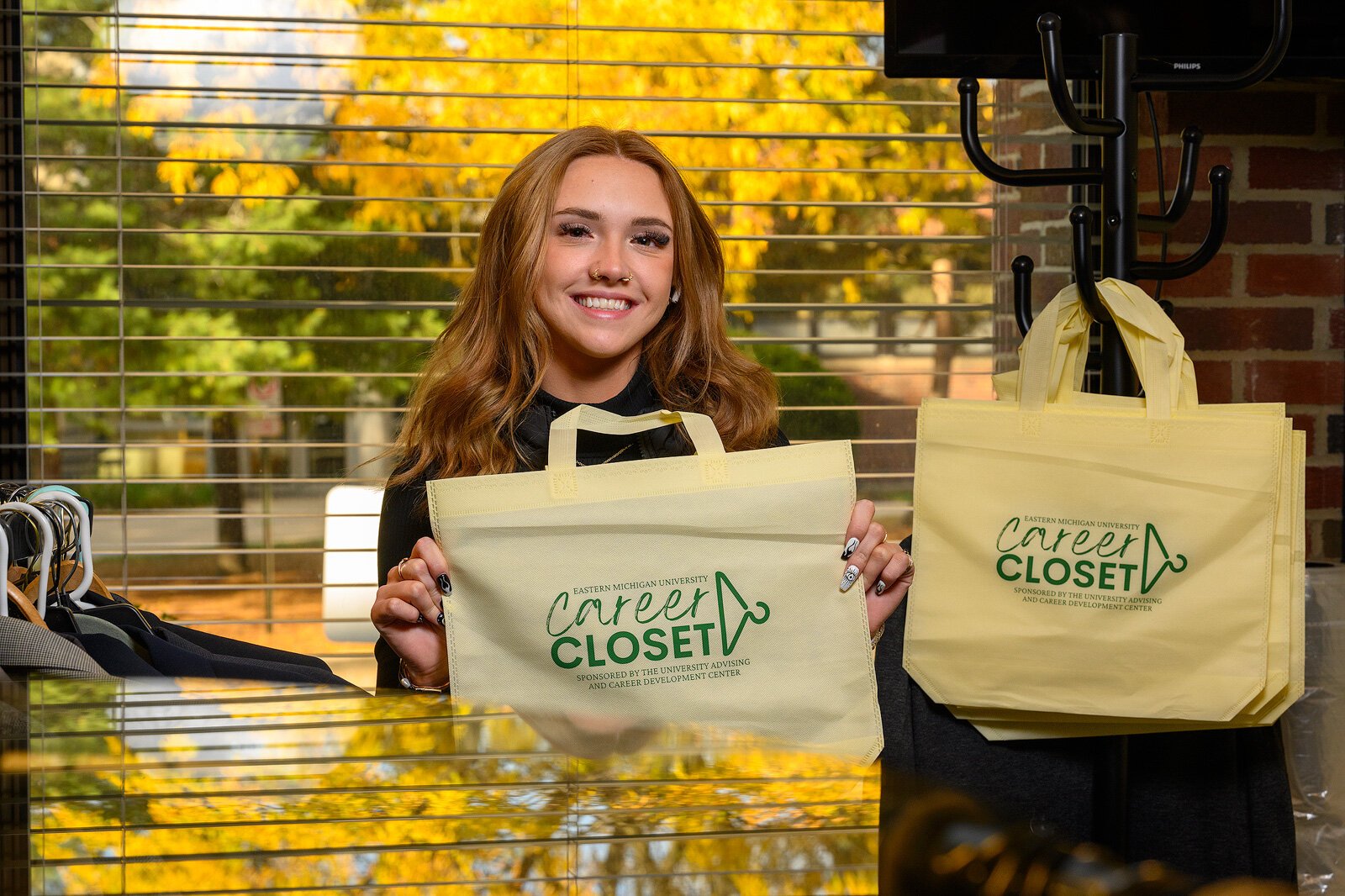EMU fashion marketing innovation student Hannah Smalley at the EMU Career Closet.