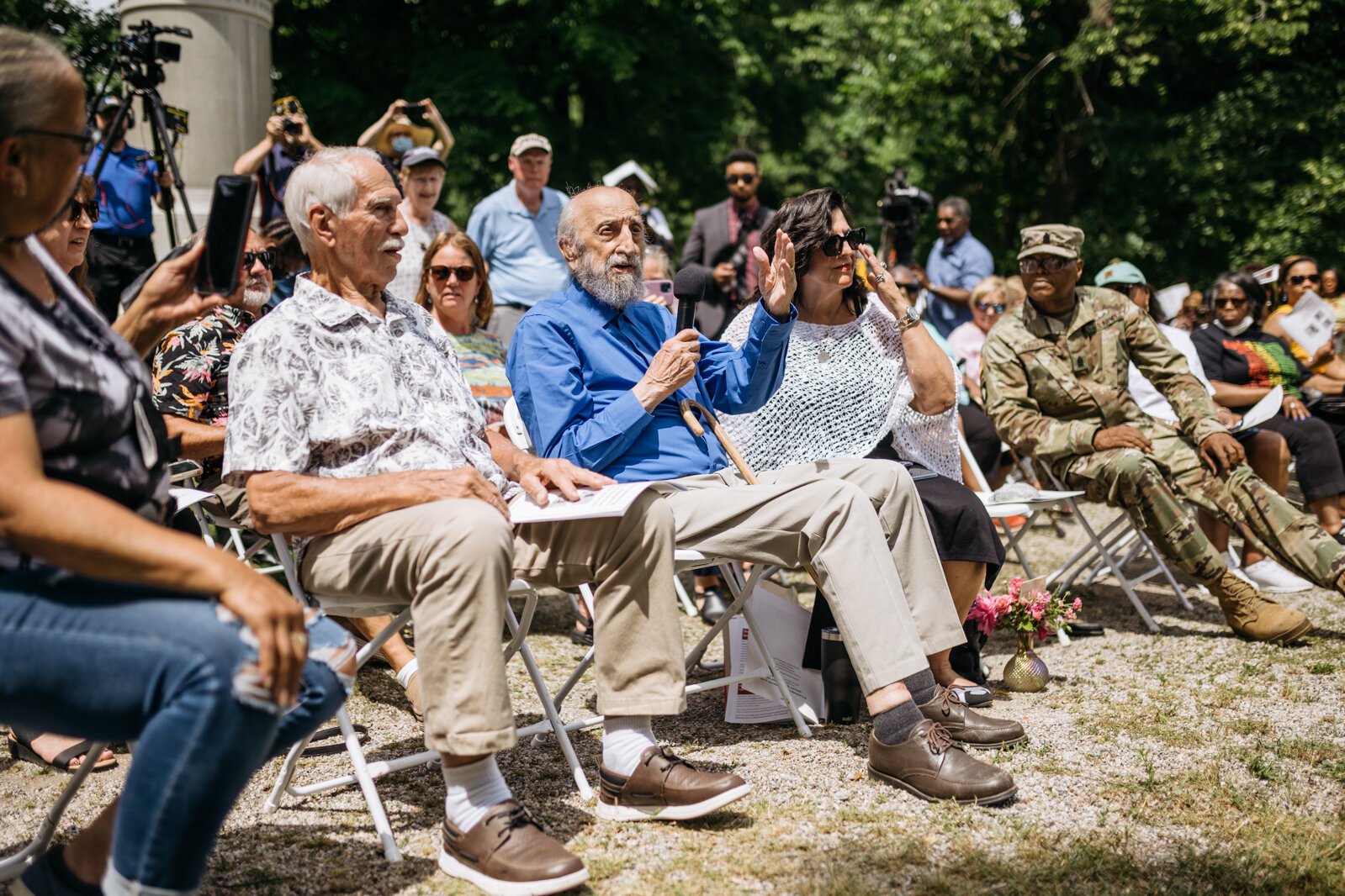 Sculptor John Pappas speaks at the monument unveiling.