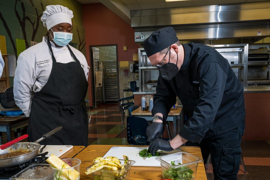 RCTC culinary student Kadiatou Kaba and Chef Aaron Gaertner.