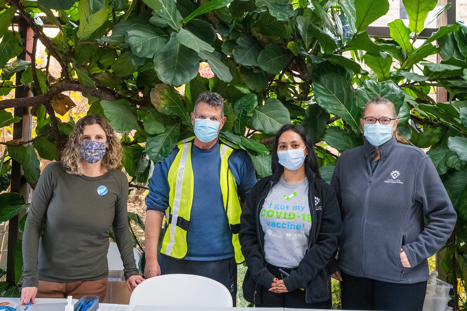 Kerri Hudson, David White, Lupe Cervantes, and Susan Ringler-Cerniglia at a Washtenaw County Health Department vaccine clinic.