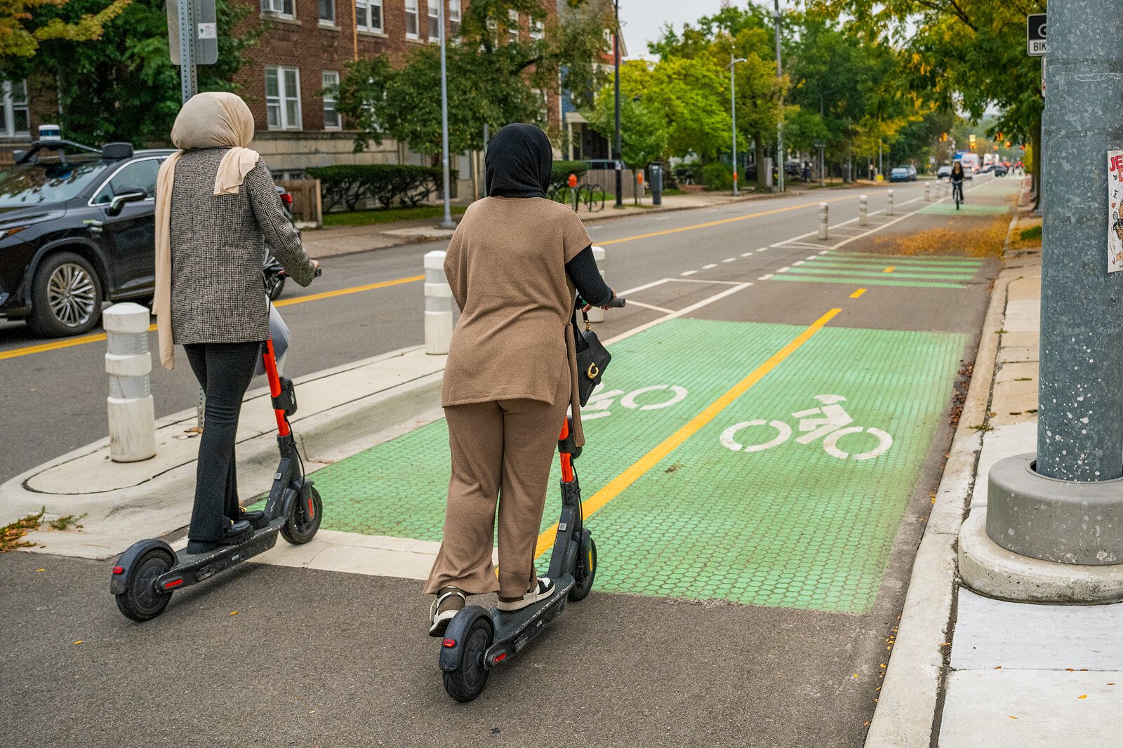 Scooters on the East William Street bike lanes in Ann Arbor.