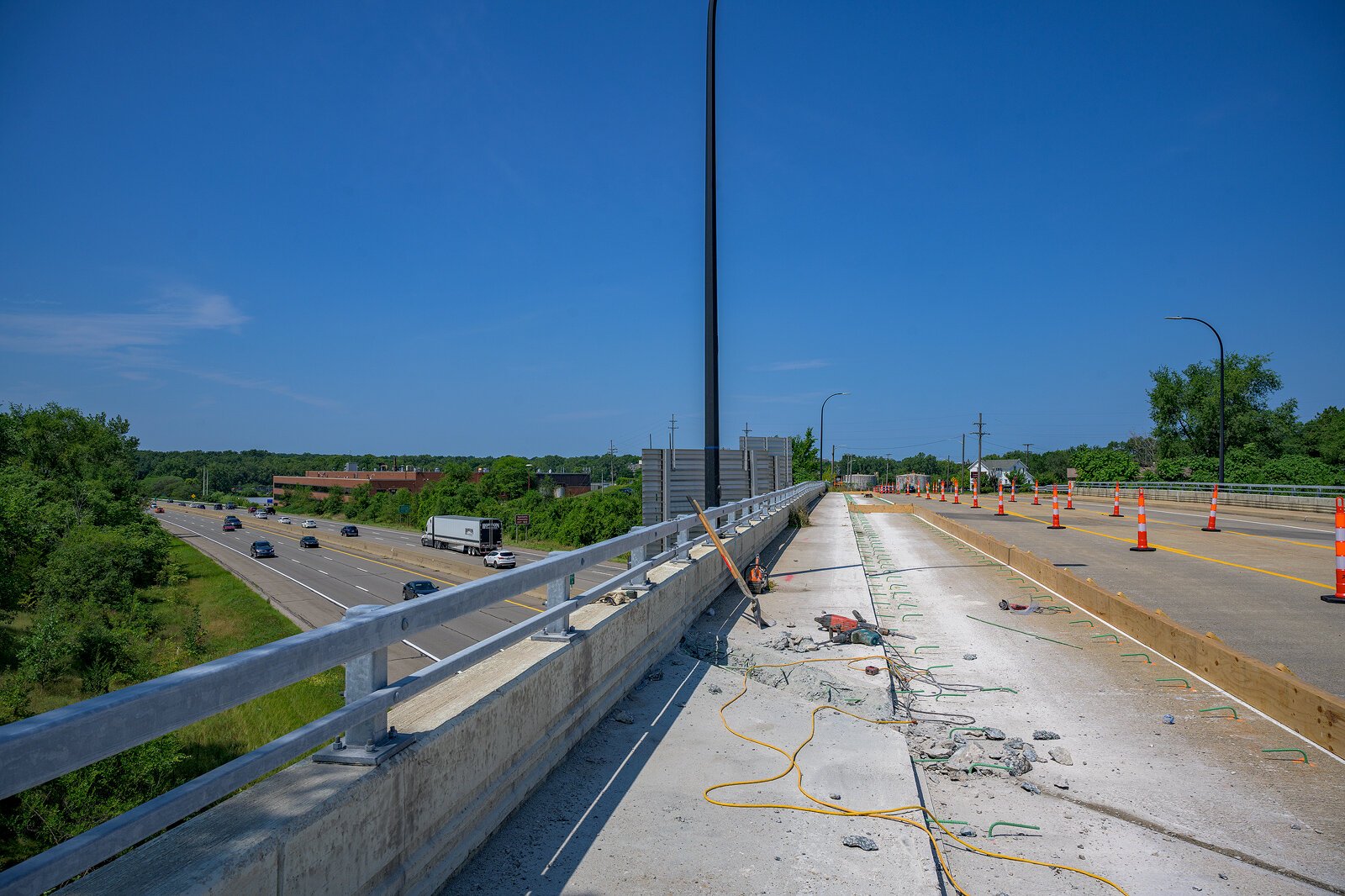 Widening the trail on South Grove crossing I-94.