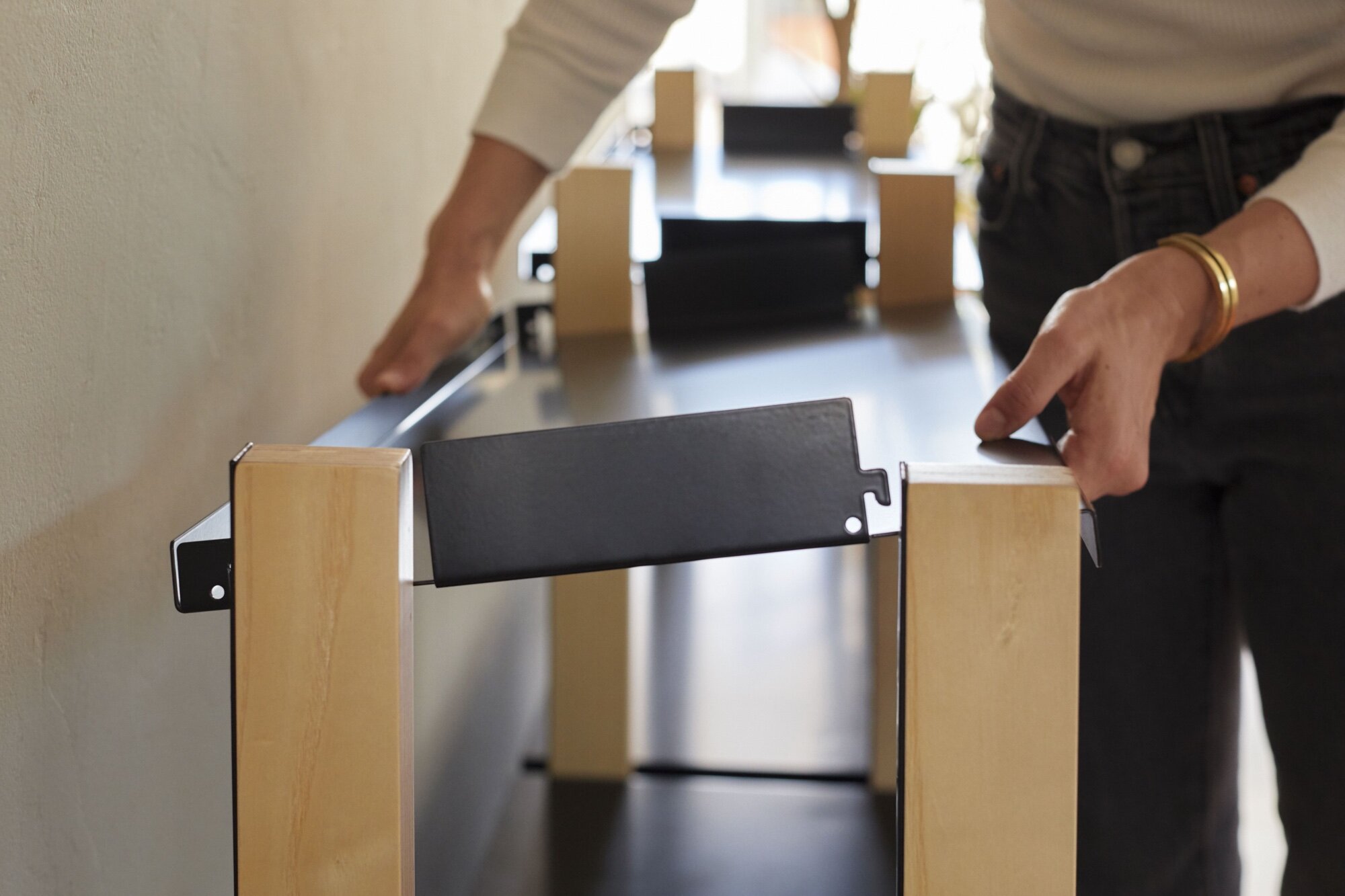 The proprietary design of The Floyd Shelving System features a hidden track that makes adjusting and adding on to your shelving system incredibly easy. No pegs, screws or tools.