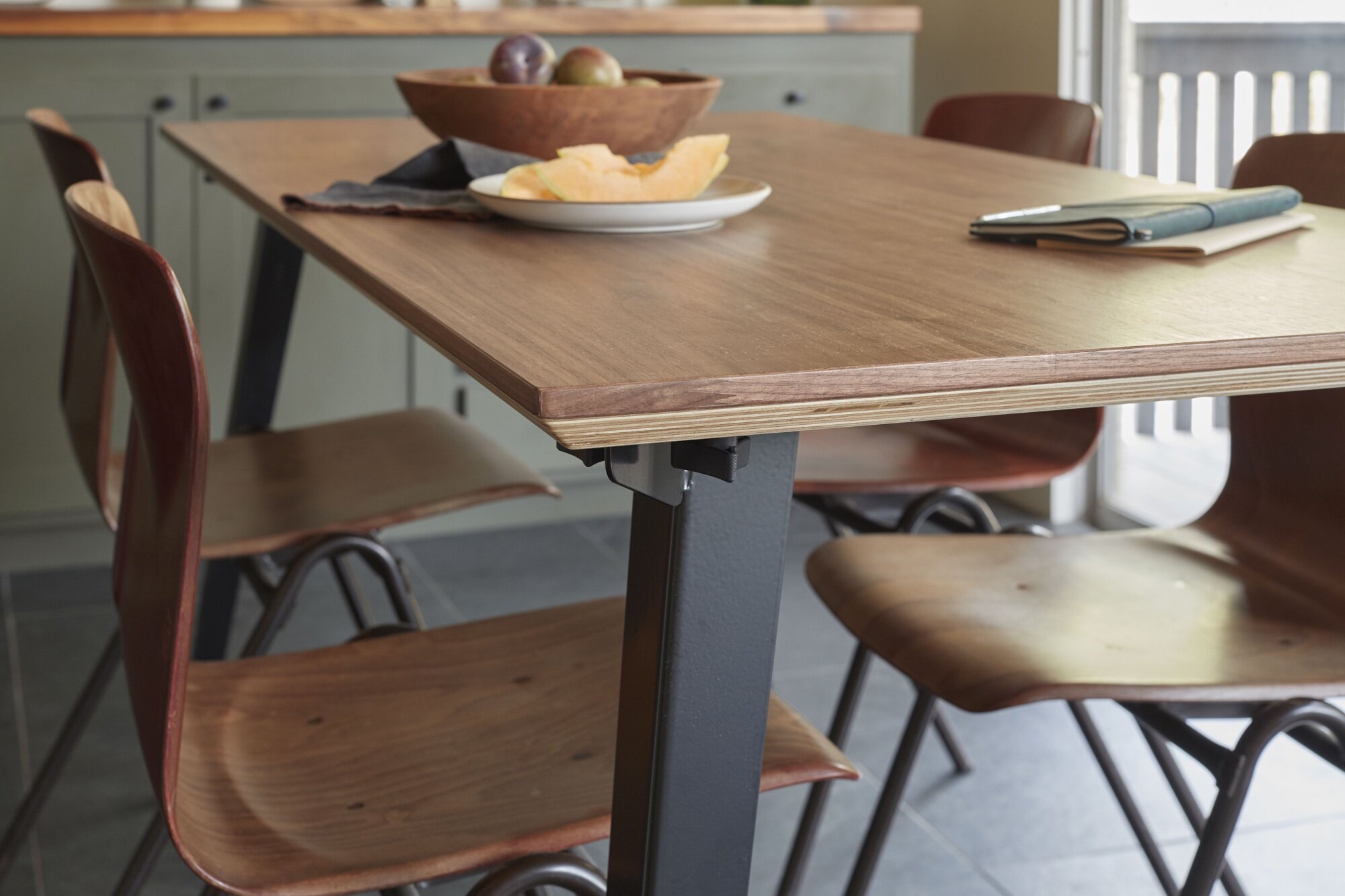 The Floyd Table in Walnut/Black.