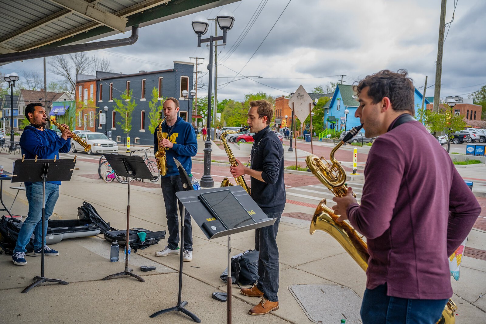 Salvador Flores, Walt Puyear, Andrew MacRossie, and Matthew Koester during an Ann Arbor Camerata performance at Kerrytown Farmers Market.