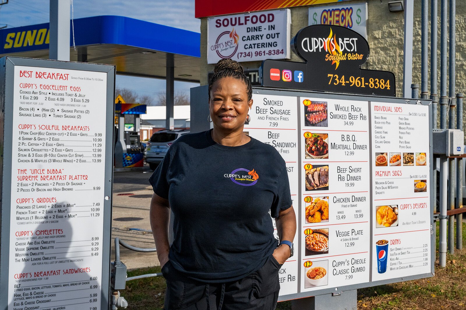 Cuppy's Best Soulful Cafe owner Andrea "Cuppy" White at the drive-through order speaker box.