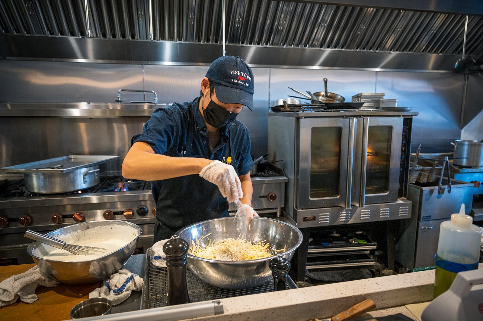 Dan Klenotic prepares food at Bellflower.