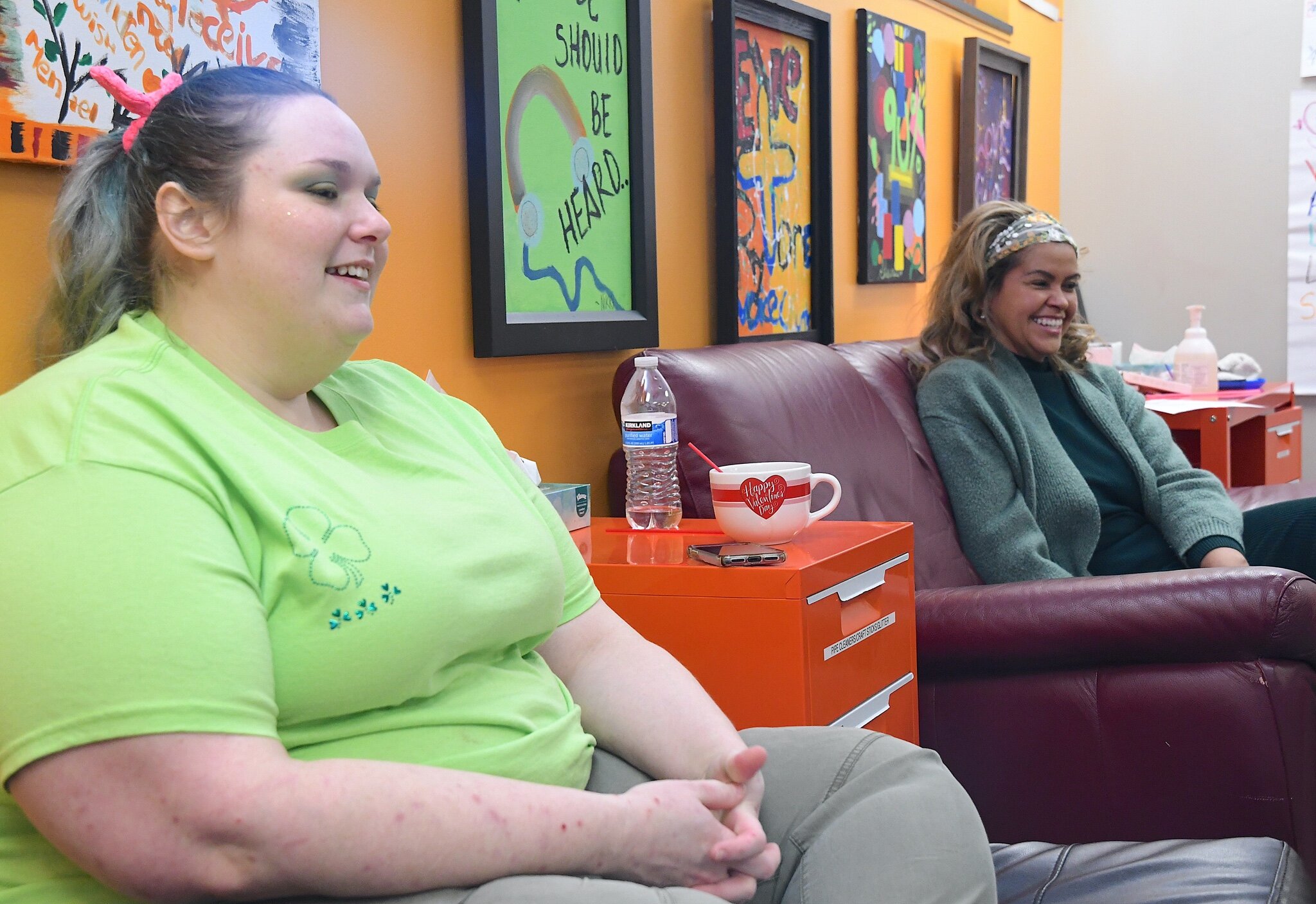 Tabi Swain, left, listen to young people during a March Sibshop.