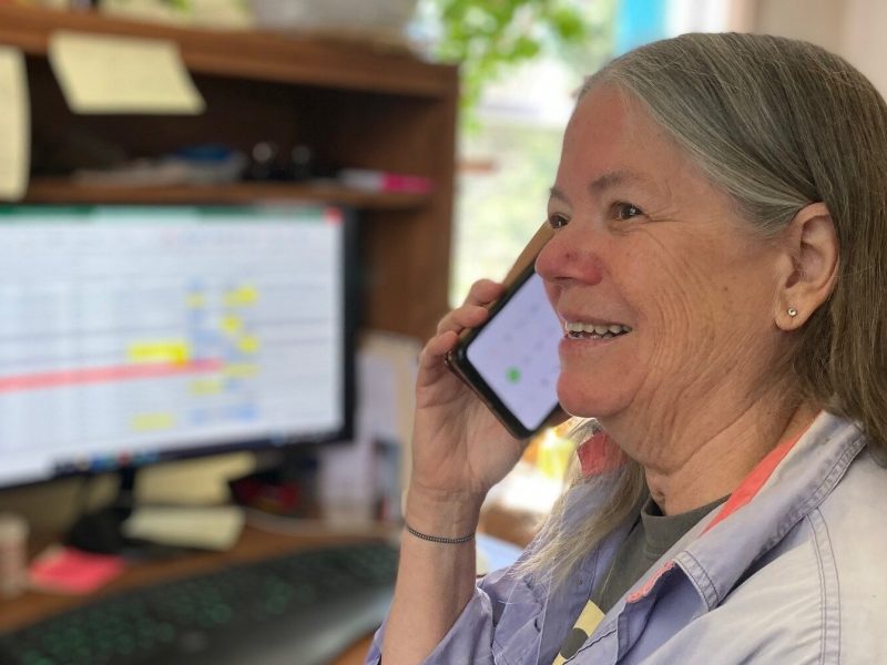 Tri-County Office on Aging volunteer Robin Barfoot makes a friendly reassurance call from her home.