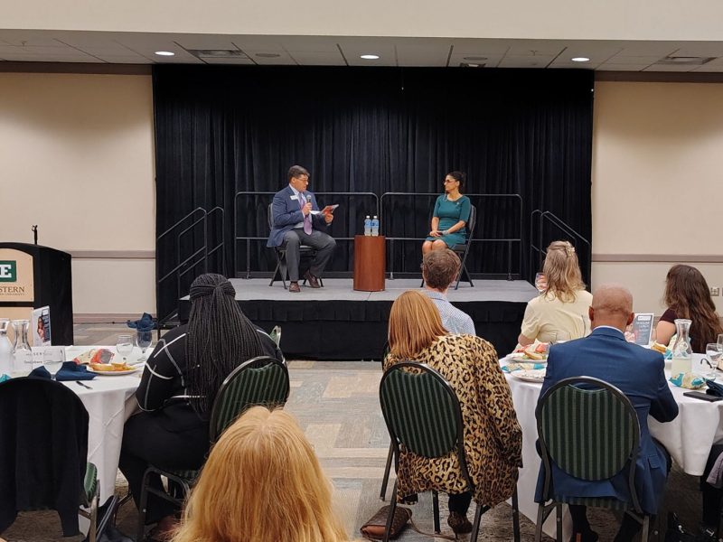 Andy Labarre, executive vice president and director of government relations for the A2Y Chamber, chats with Dr. Mona Hanna at the Eastern Michigan University Student Center.
