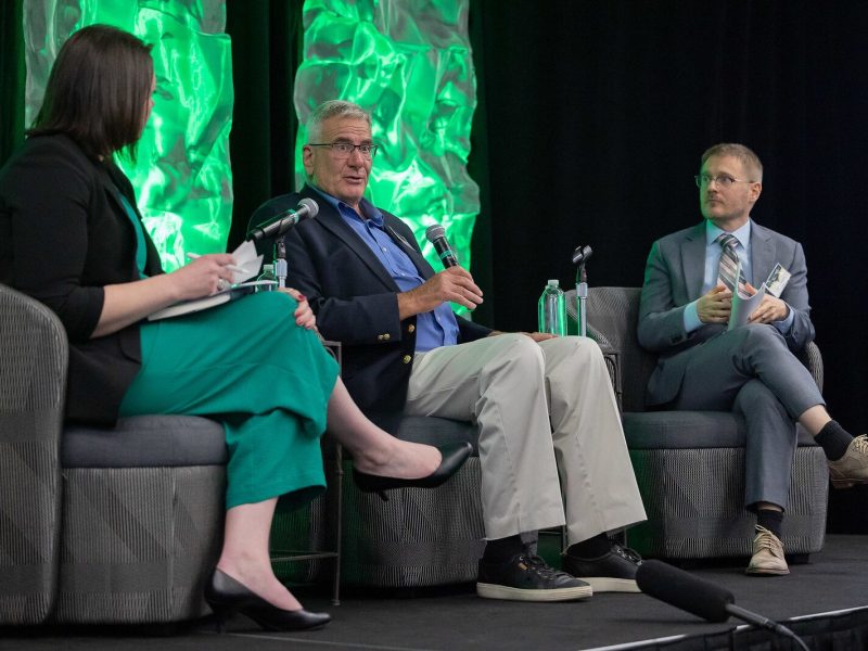 Economists Donald Grimes (center) and Dr. Gabriel Ehrlich (right) present the 40th annual Washtenaw County Economic Outlook report.