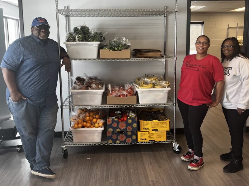 Bonnie Billups Jr., Lakesha Williams, and Latricia Juide in the HUB Community Center food pantry.