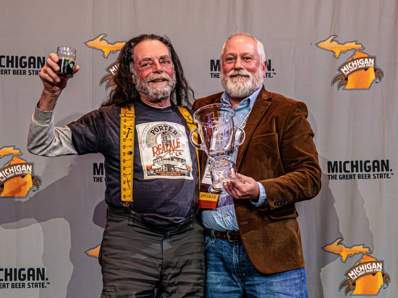 Ted Badgerow (left) receives the Tom Burns Award for brewing trailblazers.