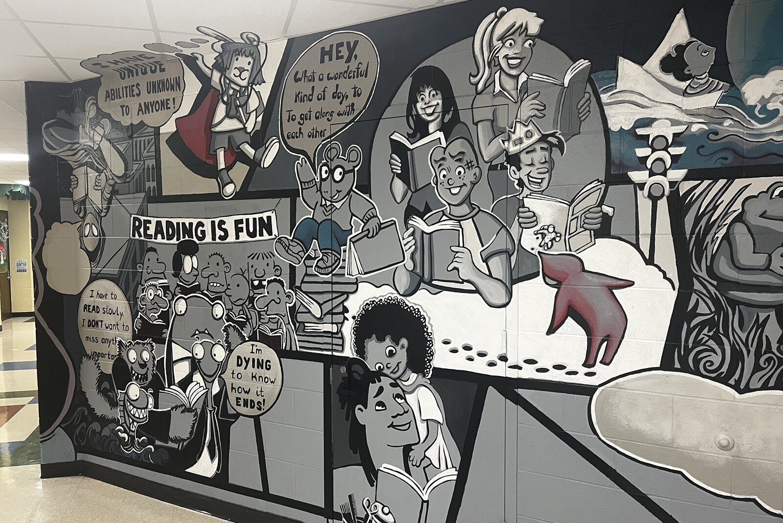 Stacy Schwartz's mural, "Reading Can Take You Places," at Estabrook Elementary School.