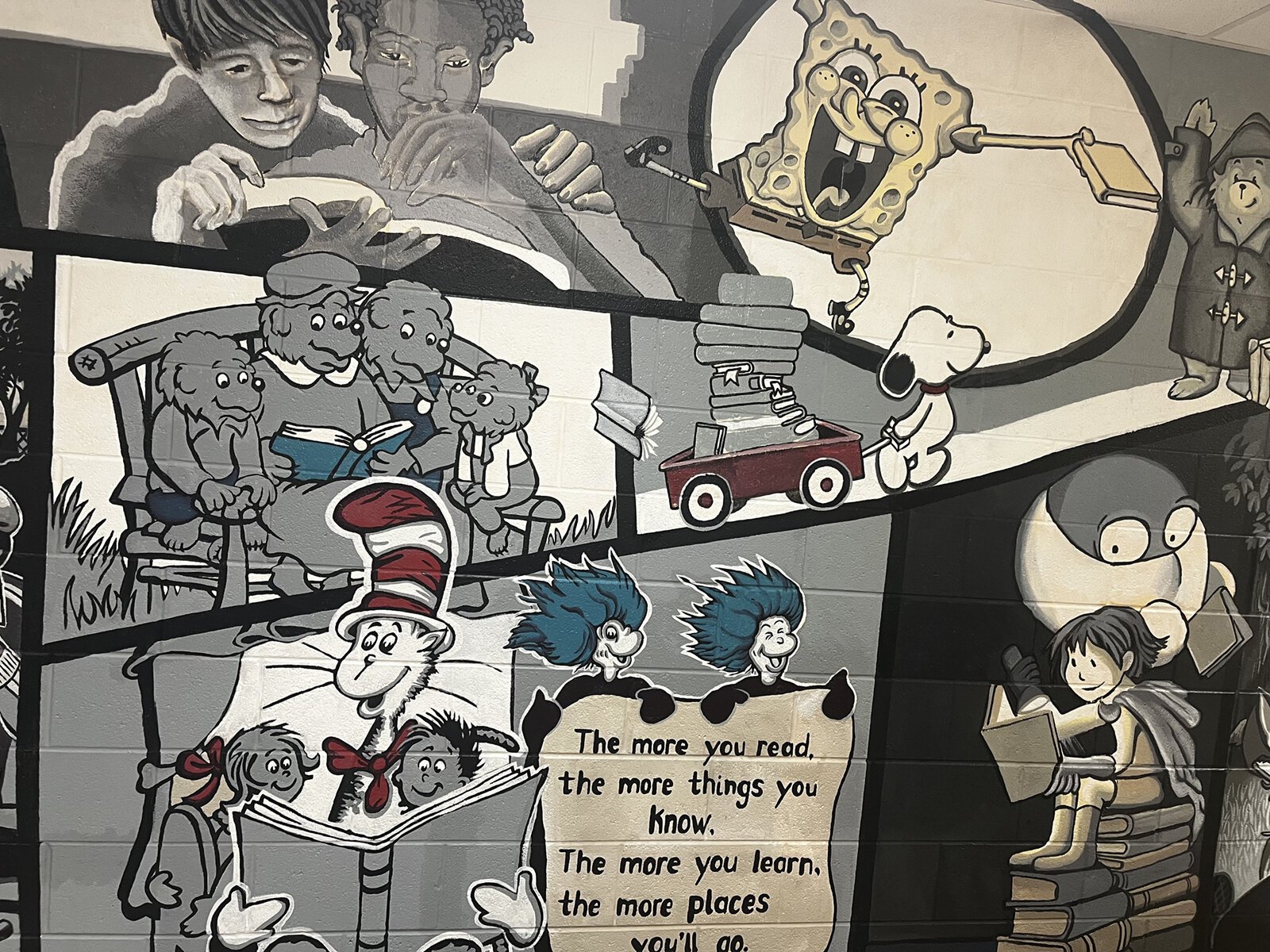 Stacy Schwartz's mural, "Reading Can Take You Places," at Estabrook Elementary School.
