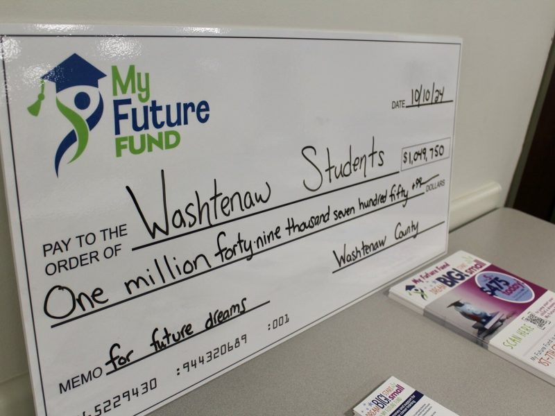 A mock check representing the funds invested in My Future Fund savings accounts so far.