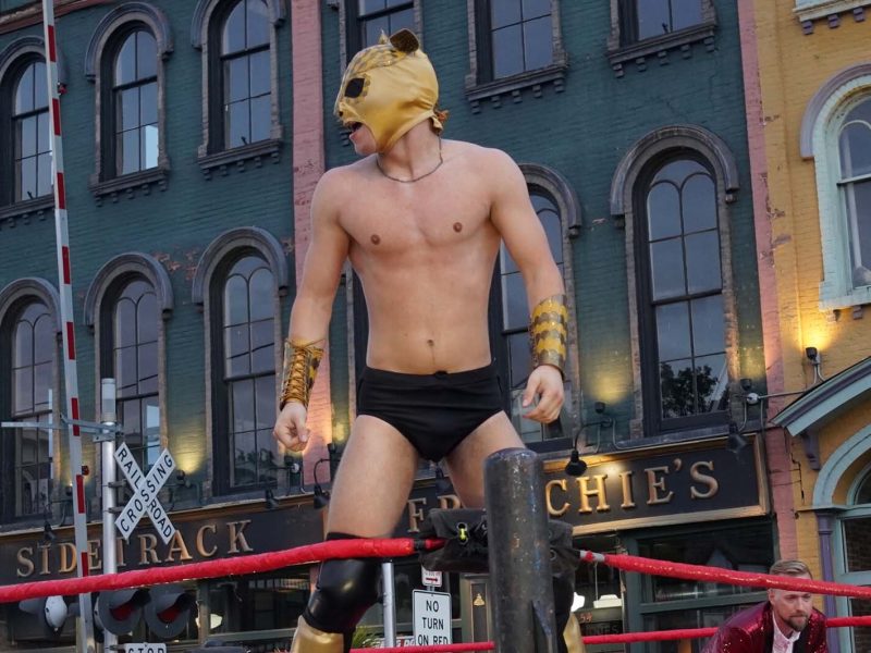 A professional wrestler performs as "Bruce Buzzbee" at the first Rumble of the Bumble in 2022.