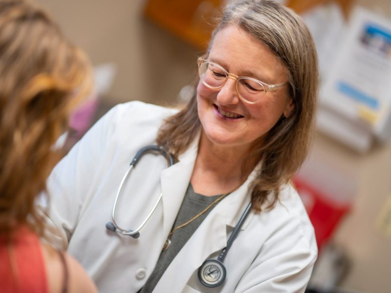 Dr. Martha Kershaw with a patient at Hope Clinic.