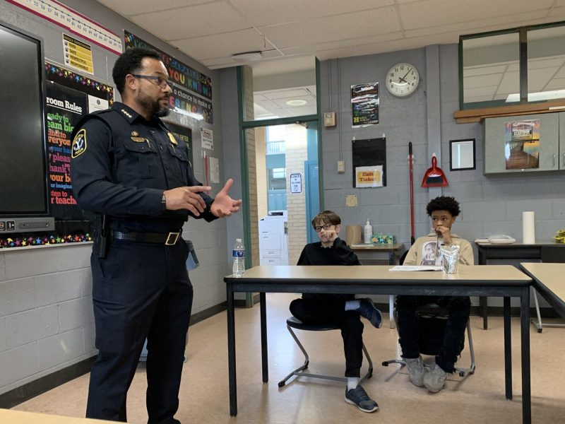 Ypsilanti Police Chief Kirk Moore speaks to Ypsilanti Community Middle School students about policing as the students prepare to interview the candidates for Washtenaw County sheriff.