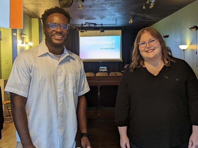 Whatabout Theatre Vice President Daniel Jackson and President Michelle Weiss setting up for Whatabout Theatre's first event on September 10, 2022.