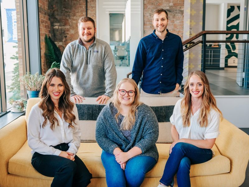The Metric Marketing team, with founder and CEO Hannah McNaughton at lower left.