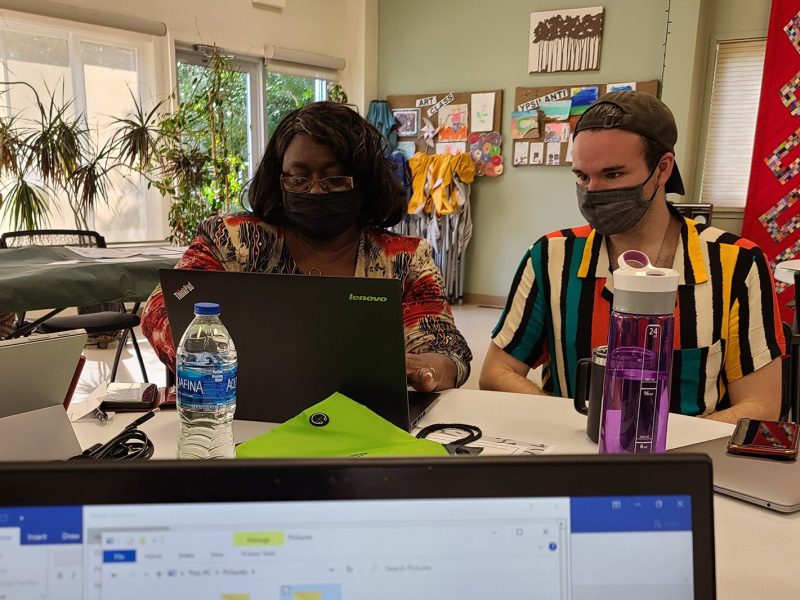 Participants Brenda and Tyler at the Digital Connecting Corps program, held by Engage@EMU at the Ypsilanti Senior Center.