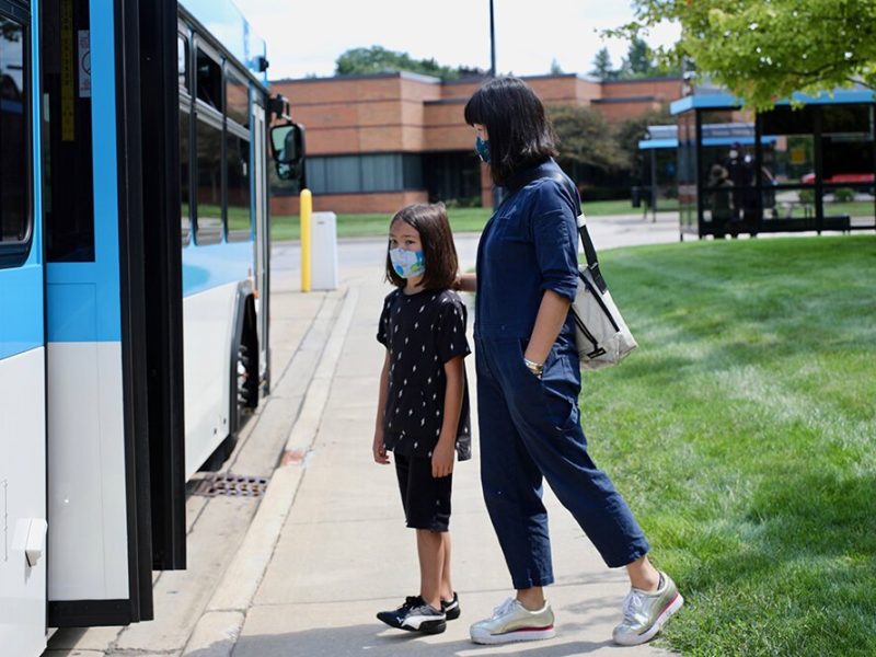 Riders board an AAATA bus.