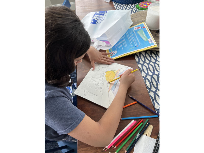ArtKits4Kids creator Mariel Gupta works on a drawing.
