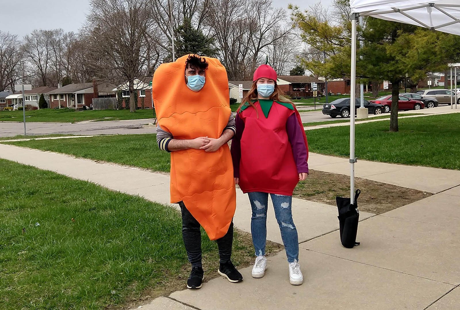University of Michigan student volunteers in veggie costumes welcomed visitors to Earth Day.