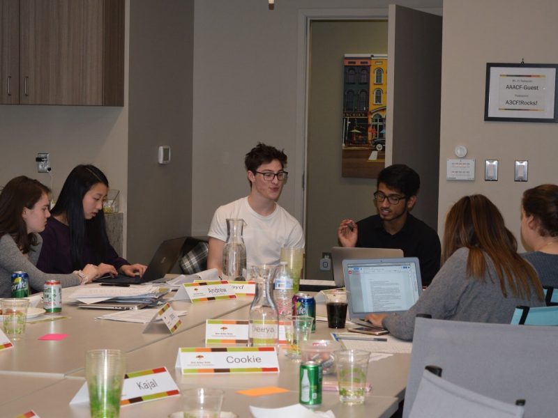 Past Youth Council members meet to discuss grantmaking.