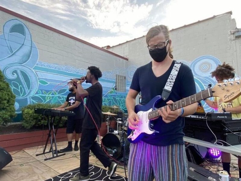 Louis Picasso and the Gallery play in Grove Studios' outdoor courtyard.