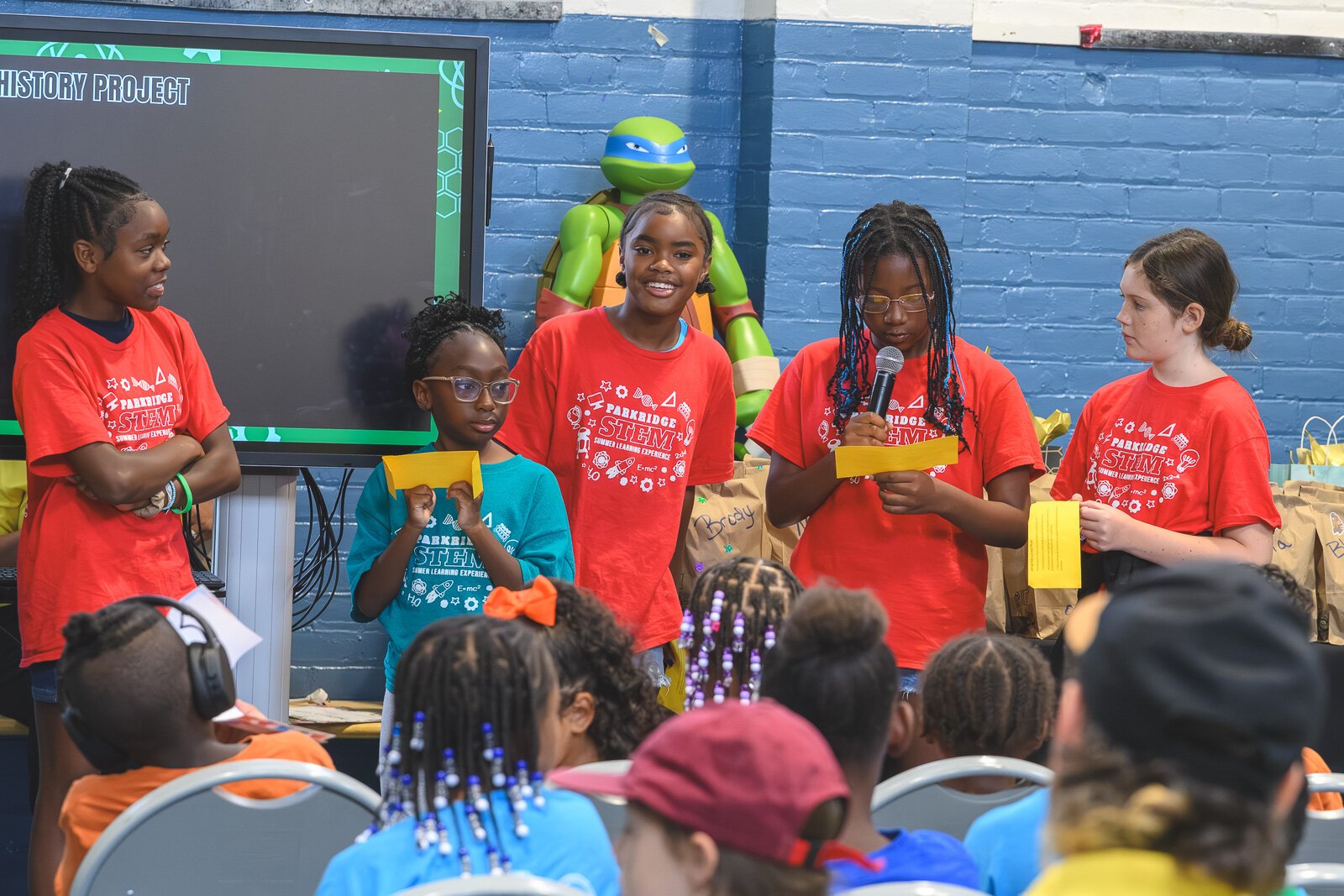 Parkridge Summer Learning Experiences students present on their Parkridge oral history project.
