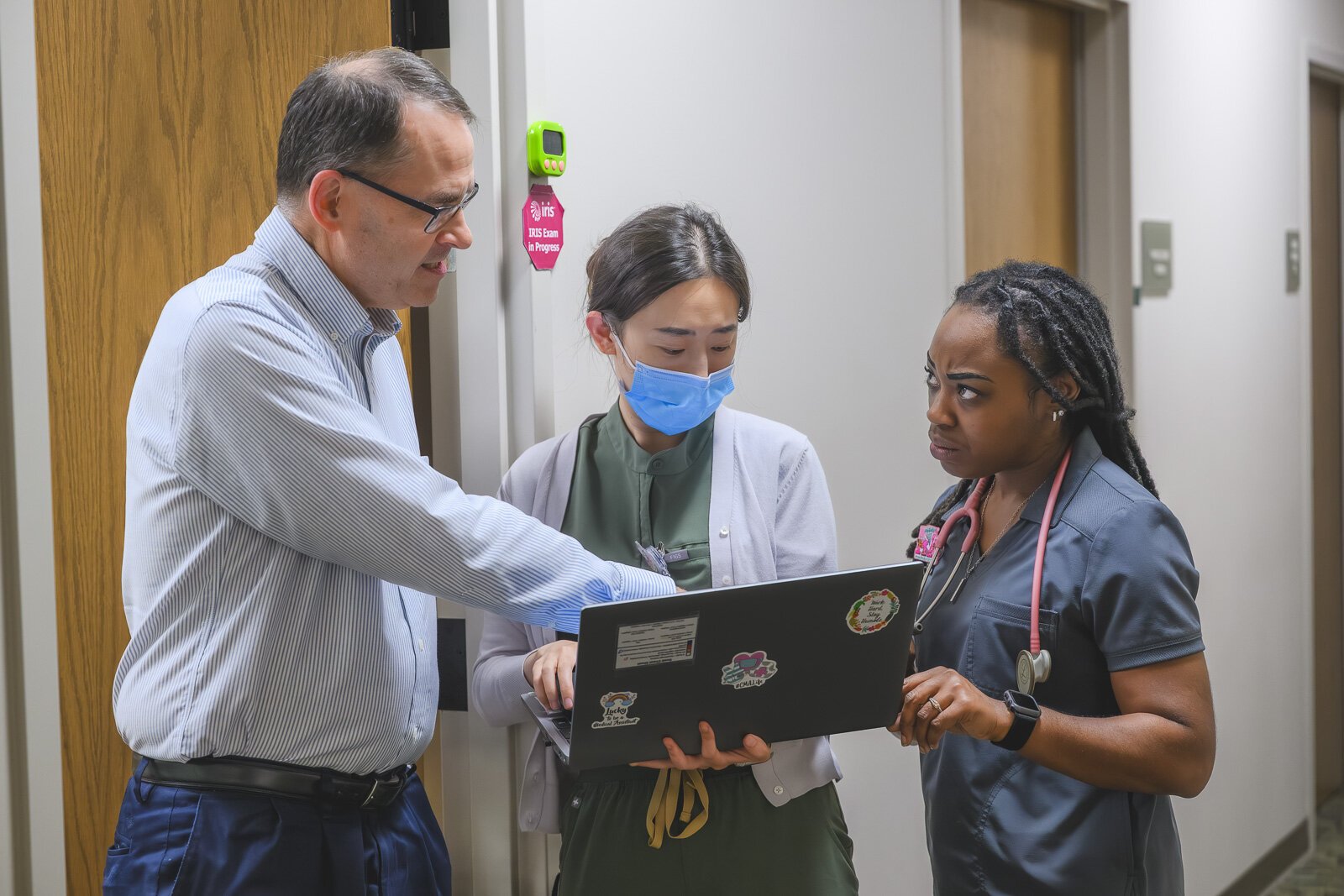 Dr. Ray Rion, executive director of Packard Health, with Packard Health staff.