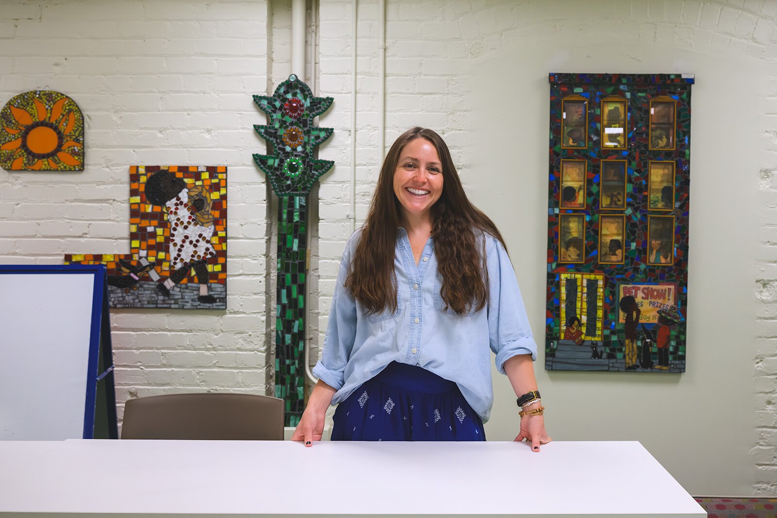 Kelly Pedersen Scott in the basement of YDL's Michigan Avenue branch, where Noise Permit programming takes place.