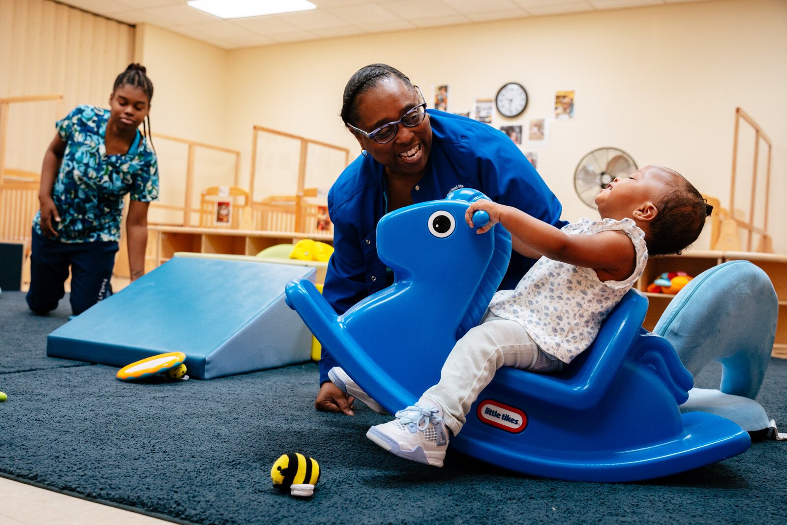 Teacher Wenturi Williams and student at New St. Paul Head Start Agency in Detroit.