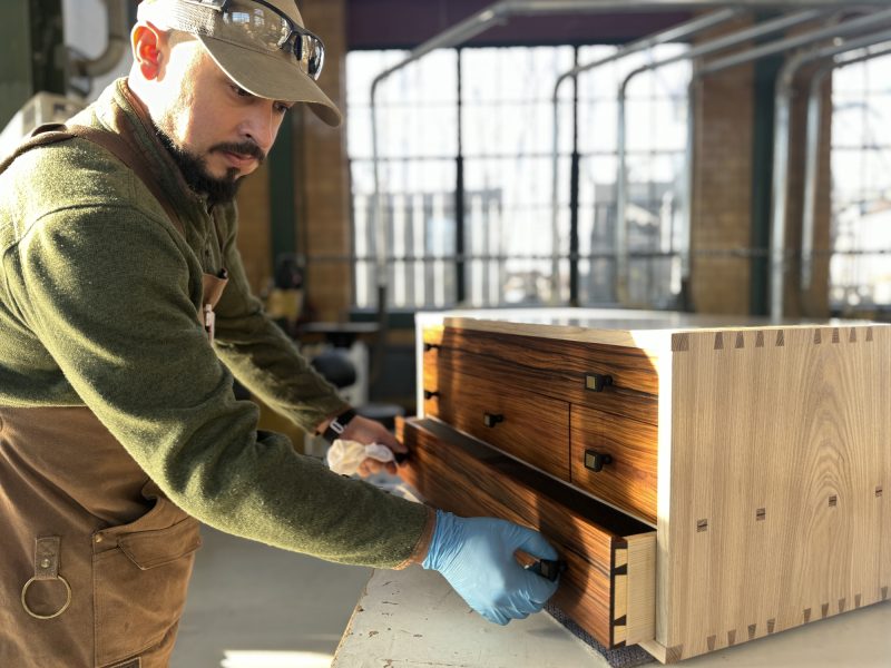 Armando Covarrubias works on a piece that will be featured in "Michigan Contemporary Craft" at the Ann Arbor Art Center.