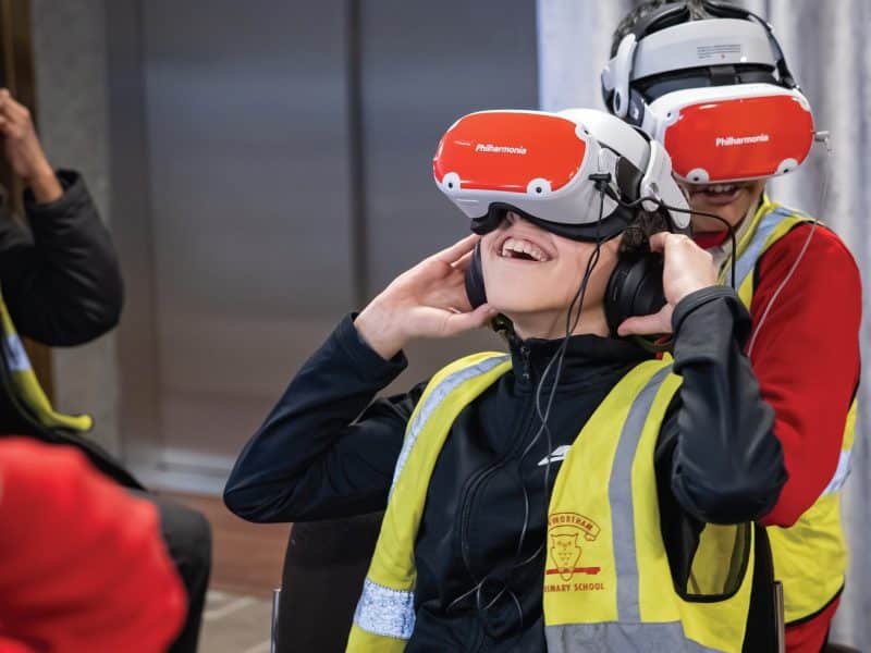 Audiences enjoy a virtual reality performance by the Philharmonia Orchestra of London.