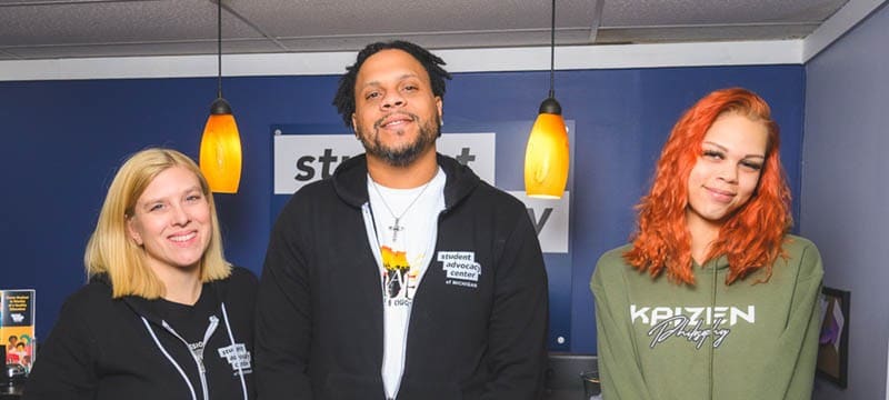 Student Advocacy Center of Michigan (SAC) Co-Executive Directors Peri Stone-Palmquist and Anell Eccleston with SAC board member Diamond Marie.