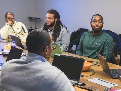 Ambassadors for the Healing Brothers United mental health program meet at Packard Health's Carpenter Road location in Ypsilanti.