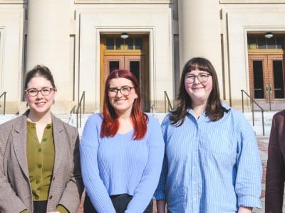 Researchers Cayenne Harris, Emily Lyon, Paige Carter Dailey, Ellen Lee, and Mark Clague at Hill Auditorium.