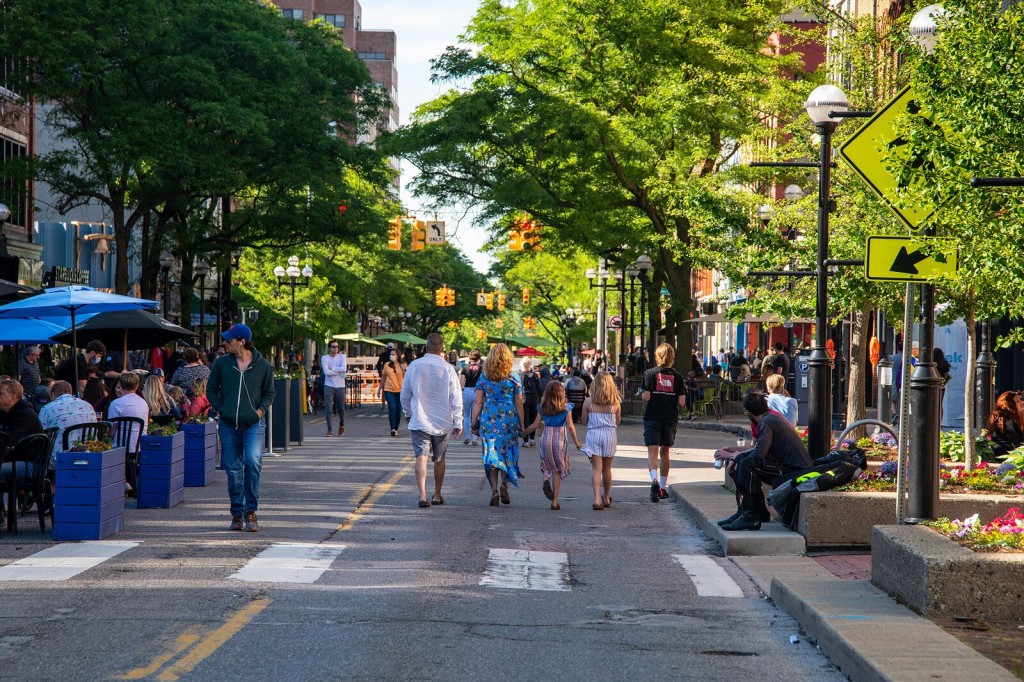 People walk in downtown Ann Arbor.